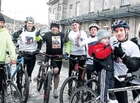 Cyclists arrive in Aber after gruelling charity ride