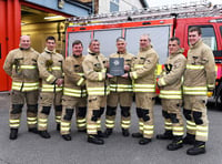 Fireman honoured with plaque for 41 years’ service