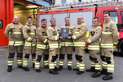 Fireman honoured with plaque for 41 years’ service