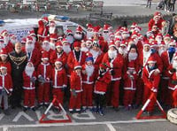 130 Santas brave a sand storm