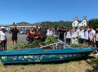 Students lend their hands to extend edible corridor