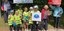 Claps and cheers for 'save our school' march