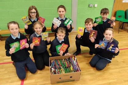 Caring pupils collect crisp bags for charity