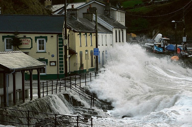 The Pentre Arms in Llangrannog takes a beating from storm waves on Friday

Picture: Ben Dearnley