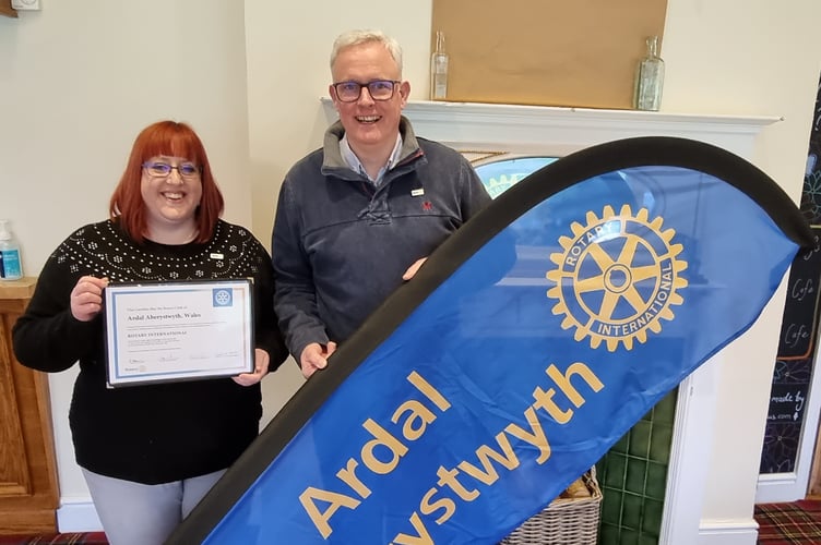 President Kerry Ferguson and executive secretary Richard Griffiths celebrated the news at their first Ardal Aberystwyth Rotary Club meeting as a recognised Rotary Club