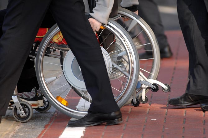 Patient in a wheelchair.