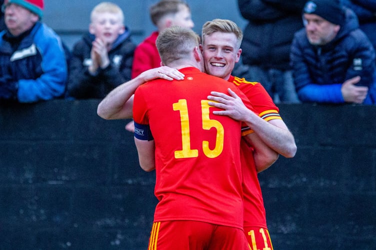 CAERNARFON, WALES - 30 MARCH 2022 - Will Evans gives Cymru the 1-0 lead at Cymru C vs England C International Friendly at The Oval, Caernarfon (Pic by Nik Mesney/FAW)