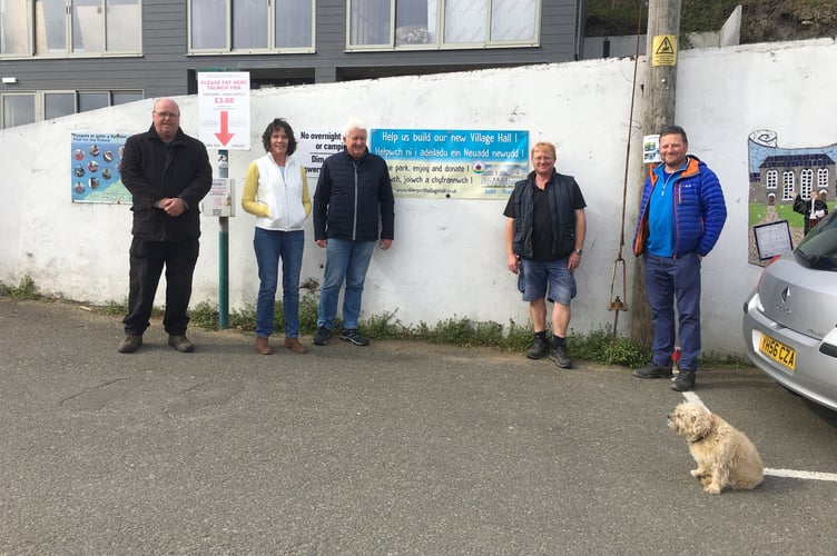 Pictured are village hall trustees Gethin Davies, Sue Lewis, Mike Harwood, Rob in Cooper and Jeremy Holmes.