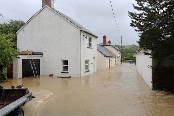 Photo Code APJ14J12 Photo Arvid Parry Jones 14June12 Ref Dylan; 
Flooding at Dolybont, near Borth Ceredigion West Wales. 