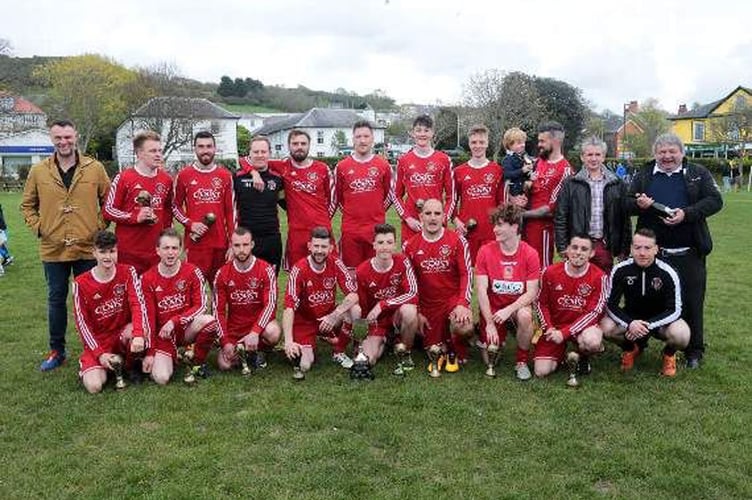 Newcastle Emlyn celebrate winning the Costcutter Ceredigion League Cup