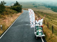 Couple push each other in wheelie bin on 200-mile trip across Wales!