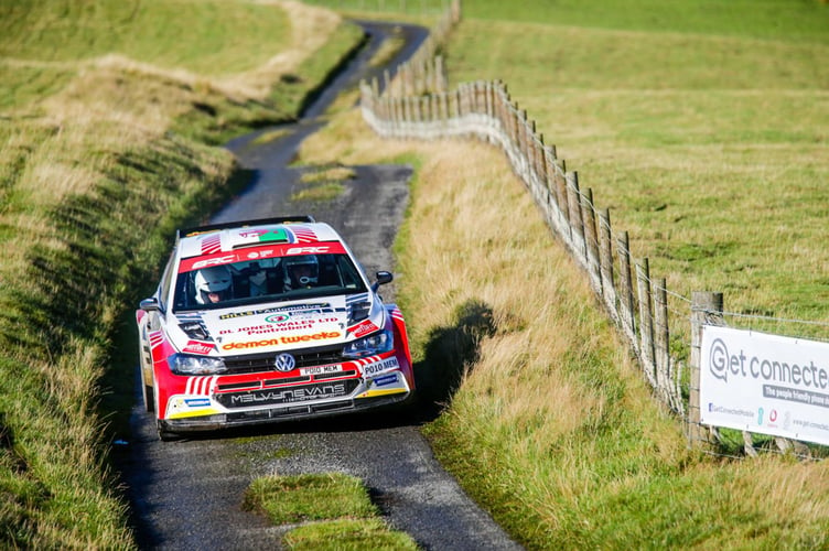 Osian Pryce and co-driver Noel O(‘Sullivan navigate their way down a narron Ceredigion lane 2022