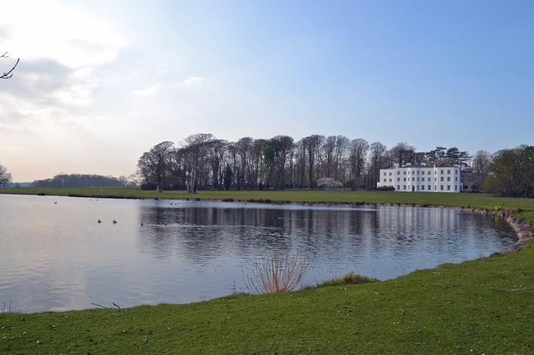 The impressive Vaynol Hall and lake