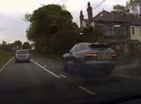 Jaguar driver overtakes three cars approaching a blind bend on A487