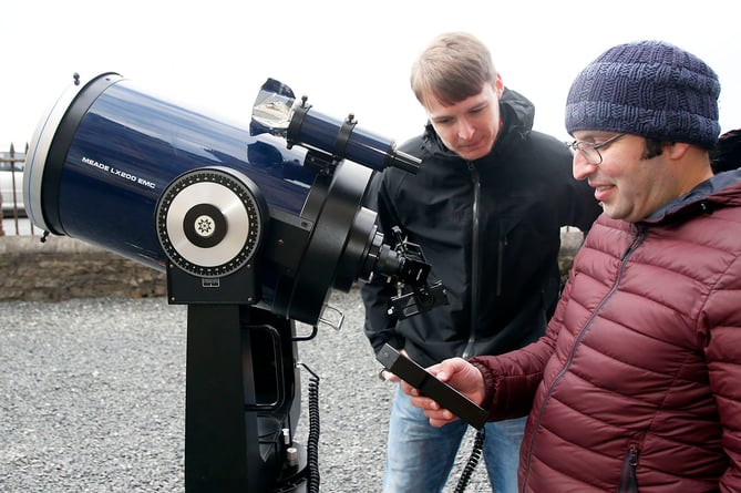 AB1411 MERCURY178 PHOTO CODE 19DPJ14NOV178 - PHOTO DAVID ARWYN PARRY JONES / CAMBRIAN NEWS PRESS PHOTOGRAPHER - 14NOVEMBER2019 - REF Dylan; PRESS RELEASE - Scientists at Aberystwyth University are to set up telescopes on the promenade next week to give people a glimpse of a rare astral event. The Department of Physics at Aberystwyth University is holding a public event to mark the rare transit of the planet Mercury across the front of the Sun on Monday, 11 November. Such an alignment only happens around 13 times every century and it will be 2032 before the next occurrence takes place. As Mercury is the smallest planet, the transit can only be viewed from Earth using special telescopes fitted with proper solar filters. Staff and postgraduate students from the Department of Physics will be setting up four telescopes equipped with solar and hydrogen alpha filtering outside the Old College on the seafront at Aberystwyth.
The telescopes will allow observers not only to view the slow transit of Mercury across the solar disk but also to see the atmosphere of the Sun â as long as the weather is clear.
In case of cloud cover, screens will be set up inside the Old College showing a live stream from other countries of Mercuryâs transit from 12.30pm until 4.30pm. Solar researcher and PhD student Gabriel Muro said: âBy organising this public event, we want to give students, school pupils and other members of the local community the opportunity to safely view this rare solar event for themselves, using the correct equipment."
During the event at the Old College, staff from the Department of Physics will also deliver a series of short talks relating to Mercury, the Sun, and planetary transits - Entry is free and all are welcome. - PHOTO - L/R Dylan Williams - Physics PHD Student at Aberystwyth University and Dr David Kuridze - Aberystwyth University Physics Department, pictured outside the Old College with a Celestron Telescope 