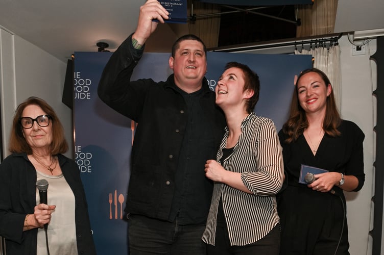 LONDON, ENGLAND - OCTOBER 17: (L to R) Elizabeth Carter, Gareth Ward, guest and Chloe Hamilton attend The Good Food Guide Awards 2023 at The Groucho Club on October 17, 2022 in London, England. (Photo by David M. Benett/Dave Benett/Getty Images)