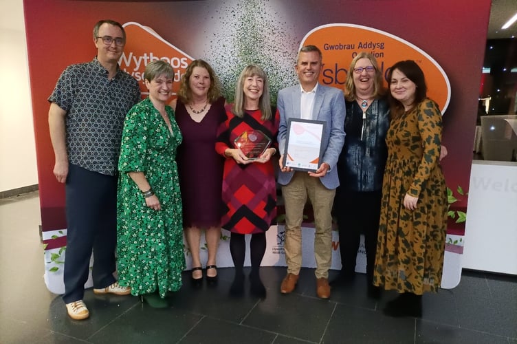 Image: (L-R) Richard Speight – UNISON WULF, Caryl Jones, Learning & Development Officer; Debbie Barron, Senior Learning & Development Coordinator; Debbie Ayriss, Principal Officer – Learning & Development; Geraint Edwards, CLO – People & Organisation; Denise Owen, Coordinator – Community Learning; Lynne Connolly, Senior Learning & Development Officer