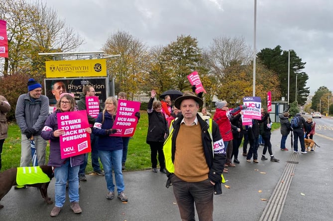 John Gough and other staff out striking. 