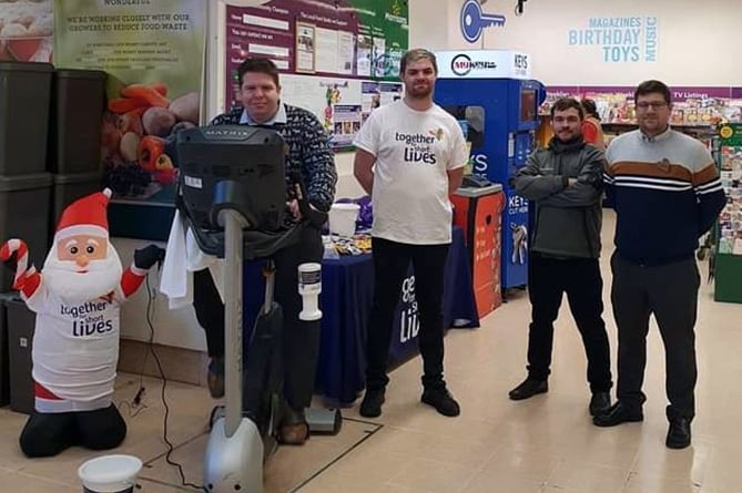 Morrisons Aberystwyth community champion Evans Tudor and store manager Chris McWhinnie during the Race to the North Pole challenge