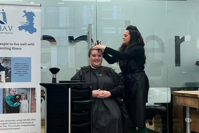 Rachel Davies being shaved by Jacquie McCartney of Jago Hair Salon, Aberystwyth 