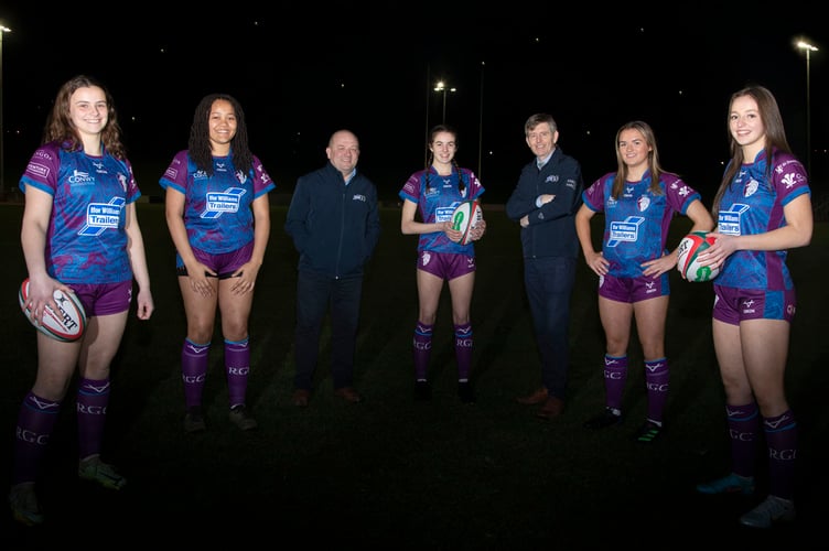 Ifor Williams Trailers sponsors of under 18's Ladies Rugby; Paul Davies and John Williams of Ifor Williams Trailers with rugby players Branwen Metcalfe, Llio Mutembo, Neisha Roberts,Catrin Stewart and Hannah Lane .                   Picture Mandy Jones