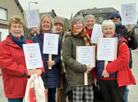 WI march raises awareness of Stop Violence Against Women campaign