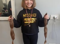 Emily, 11, has hair cut off to help people with cancer