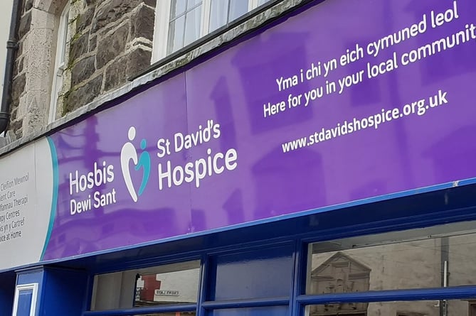 Four St David's Hospice shops in Gwynedd will shut, the charity has announced