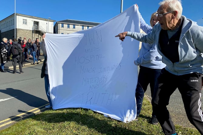 Residents gathered at the hospital on Saturday morning