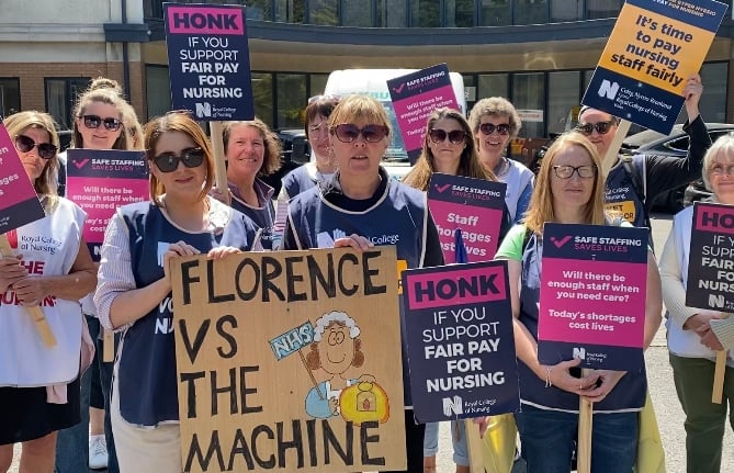 Nurses striking outside of Bronglais Hospital