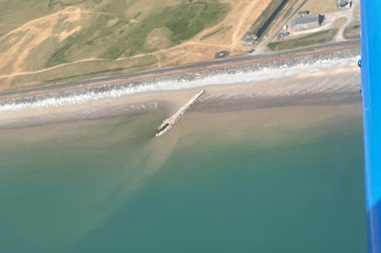 Images provided by Snowdonia flight school showing the brown discolouration in the water