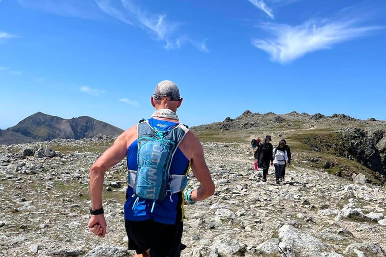 Dave Powell traversing the peaks