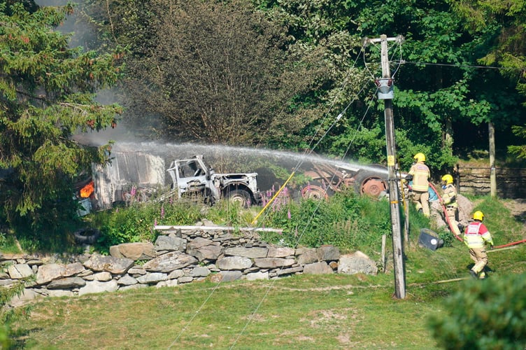 House Fire at Llan y Mawddwy Dinas Mawddwy 
Where 8 Pumps were innatendance at the FIre at Tu hwnt i'r Bont Dinas Mawddwy 
Picture Erfyl Lloyd Davies Photography