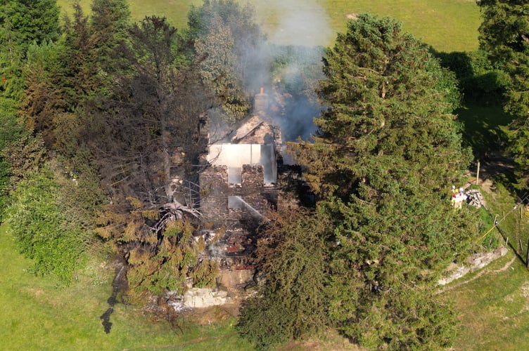 House Fire at Llan y Mawddwy Dinas Mawddwy 
Where 8 Pumps were innatendance at the FIre at Tu hwnt i'r Bont Dinas Mawddwy 
Picture Erfyl Lloyd Davies Photography