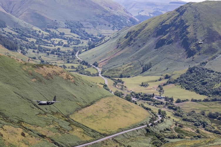 Photographed here is a 3-ship Hercules C-130J from 47 Sqn, on a final flypast before its forthcoming retirement. Images were shot at Bwlch, Mach Loop in North Wales.   See SWNS story SWNAherculesfly. As the mighty RAF Hercules transport aircraft prepares for retirement, incredible official photographs capture a historic moment in RAF history. A flypast to mark the forthcoming stand-down from RAF service took place across all four nations of the United Kingdom on Wednesday. The planned routing by three aircraft covered locations of significance to the Herculesâ service and 47 Squadron. 47 Squadron and the Hercules will continue to deliver on operations supporting UK defence objectives until 30 June.