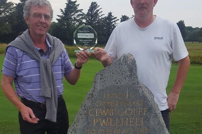 Pwllheli Golf Club captain and chairman with the award