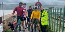 Cyclist arrives in Gwynedd on 3,500-mile journey in memory of sister