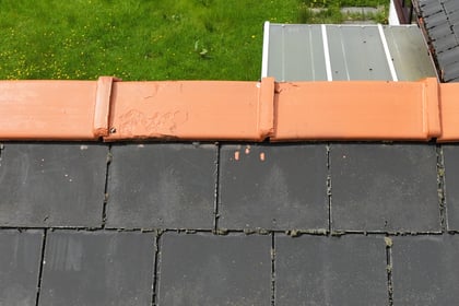 Rogue trader charged £4,600 to paint roof tiles orange 