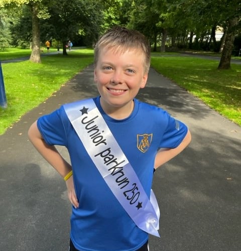 Jack Foale celebrates his 250th junior parkrun