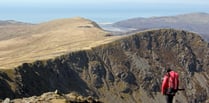 Mountaineer helped off Cader Idris after falling ill in hot weather