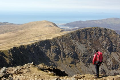 Mountaineer helped off Cader Idris after falling ill in hot weather