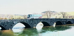 Dyfi Bridge reopens as water level drops