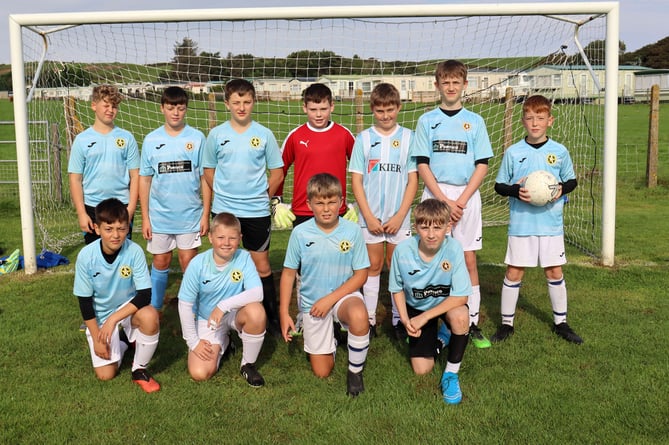 Penrhyndeudraeth Under 13s line up before their recent game against their Pwllheli counterparts at the Penyberth Fields recently