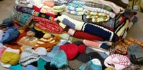 WI's Catty Crafters knit 125 winter warmers for those in need