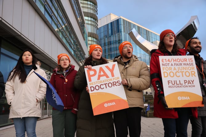 Junior doctors on a picket line outside the Queen Elizabeth Hospital, Birmingham, as members of the BMA union begin their six day strike. January 3, 2024.  The longest strike in the history of the NHS is getting under way as junior doctors take part in a six-day walkout.  Thousands of junior doctors, who make up nearly half the doctor workforce in the NHS, are expected to take part in the stoppage in England from 07:00 GMT.  NHS bosses fear it will bring routine services to a virtual standstill in some areas. 