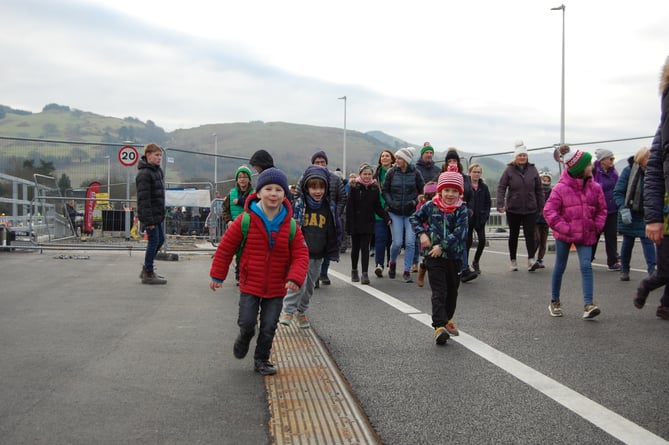 Youngsters were excited to stretch their legs on the new bridge