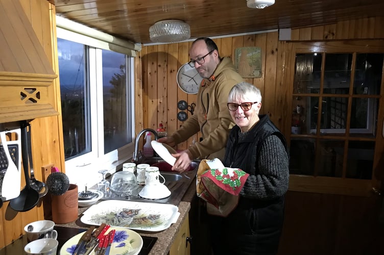 James and Audrey doing the washing up