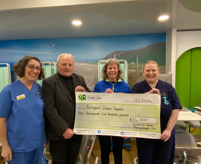 Aber 10k organisers present cheque Bronglais Hospital Chemo Unit