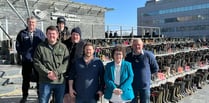 Thousands of wellies line the steps of the Senedd in protest