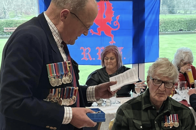 Major Drew Beaumont RWF presented Mr Bruce McCay with the Royal Welsh Regiment’s Comrades Commendation medal